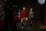 May be an image of 2 people and television
