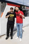 May be an image of 2 people and text