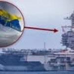 The Navy's most advanced aircraft carrier is officially flying a brand new battle flag at sea