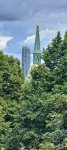May be an image of skyscraper and bell tower